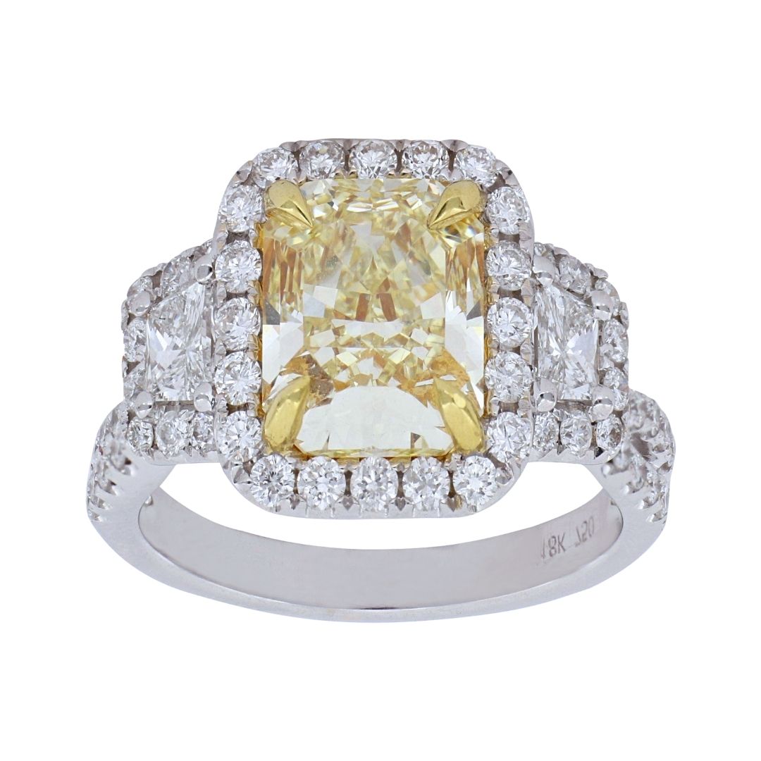 Yellow Diamond Ring (Yellow Diamond 3.01 cts. White Diamond 0.36 cts. White Diamond 0.74 cts.)