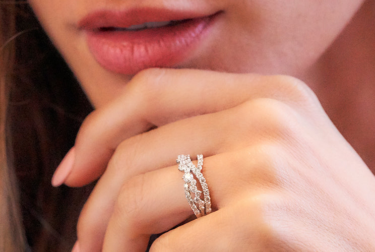 Woman's hand wearing an eternity ring
