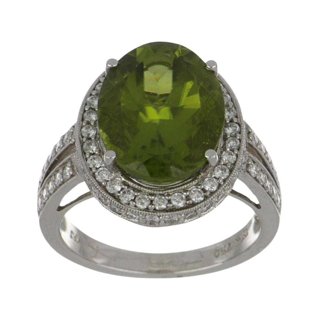 Peridot Ring (Peridot 7.7 cts. White Diamond 0.9 cts.) Not Net
