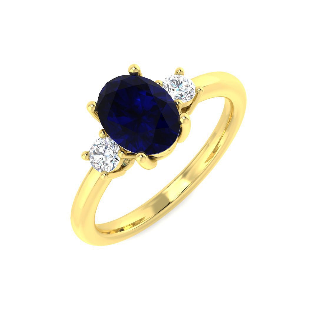 14KT Gold Oval Blue Sapphire Three - Stone Ring with Diamonds (Sapphire 1.40 cts, Diamond 0.16 cts)
