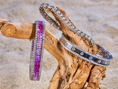 Bracelets sitting on driftwood