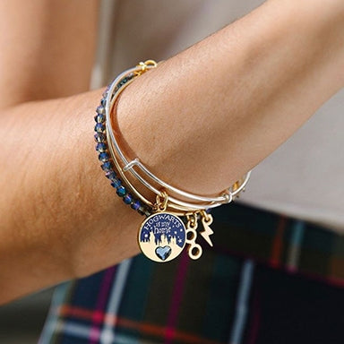 Woman wearing two Harry Potter bracelets