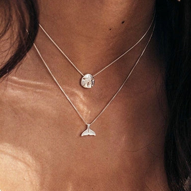 Woman wearing two ALEX AND ANI necklaces