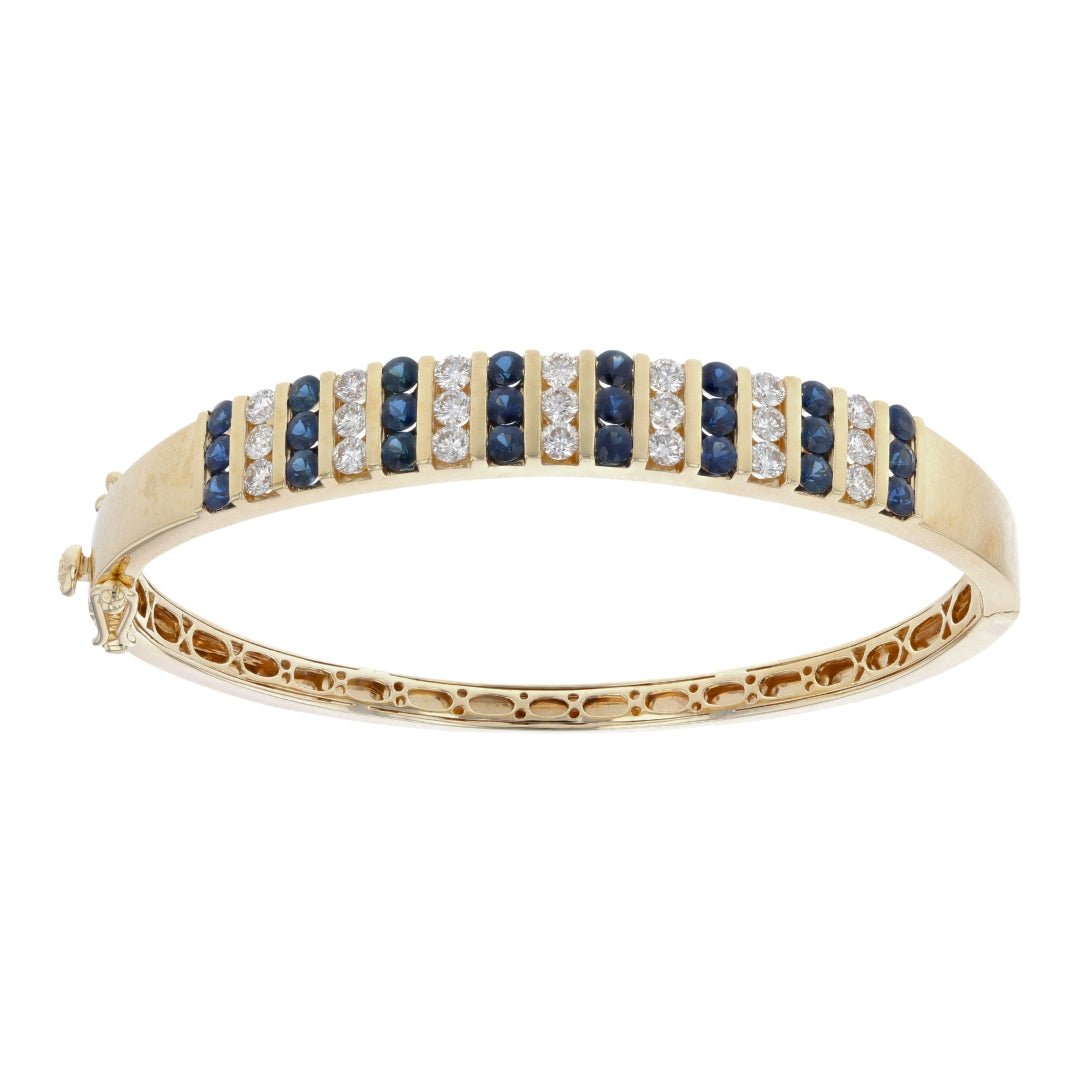Blue Sapphire Bangle (Blue Sapphire 2.3 cts. White Diamond 1.55 cts.) Not Net