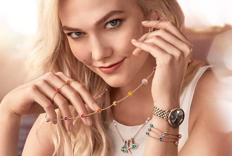 Woman wearing Swarovski necklaces and bracelets