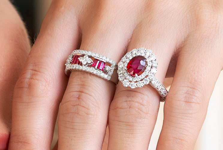 Woman's hand with ruby rings
