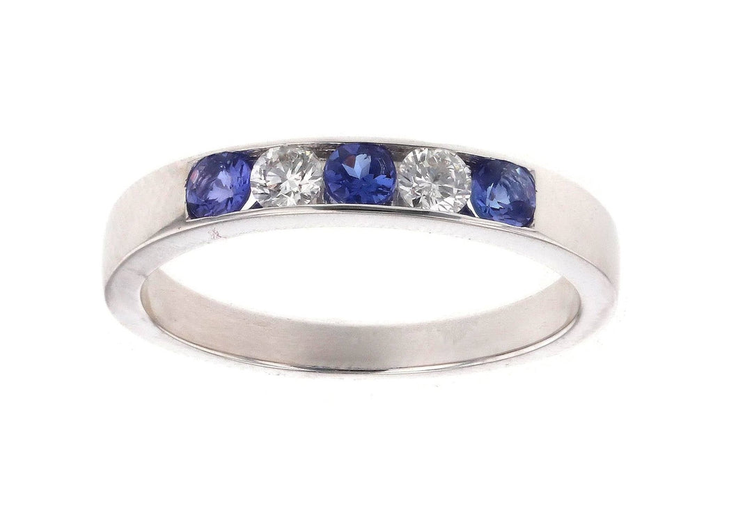Tanzanite Ring (Tanzanite 0.29 cts. White Diamond 0.21 cts.) Not Net