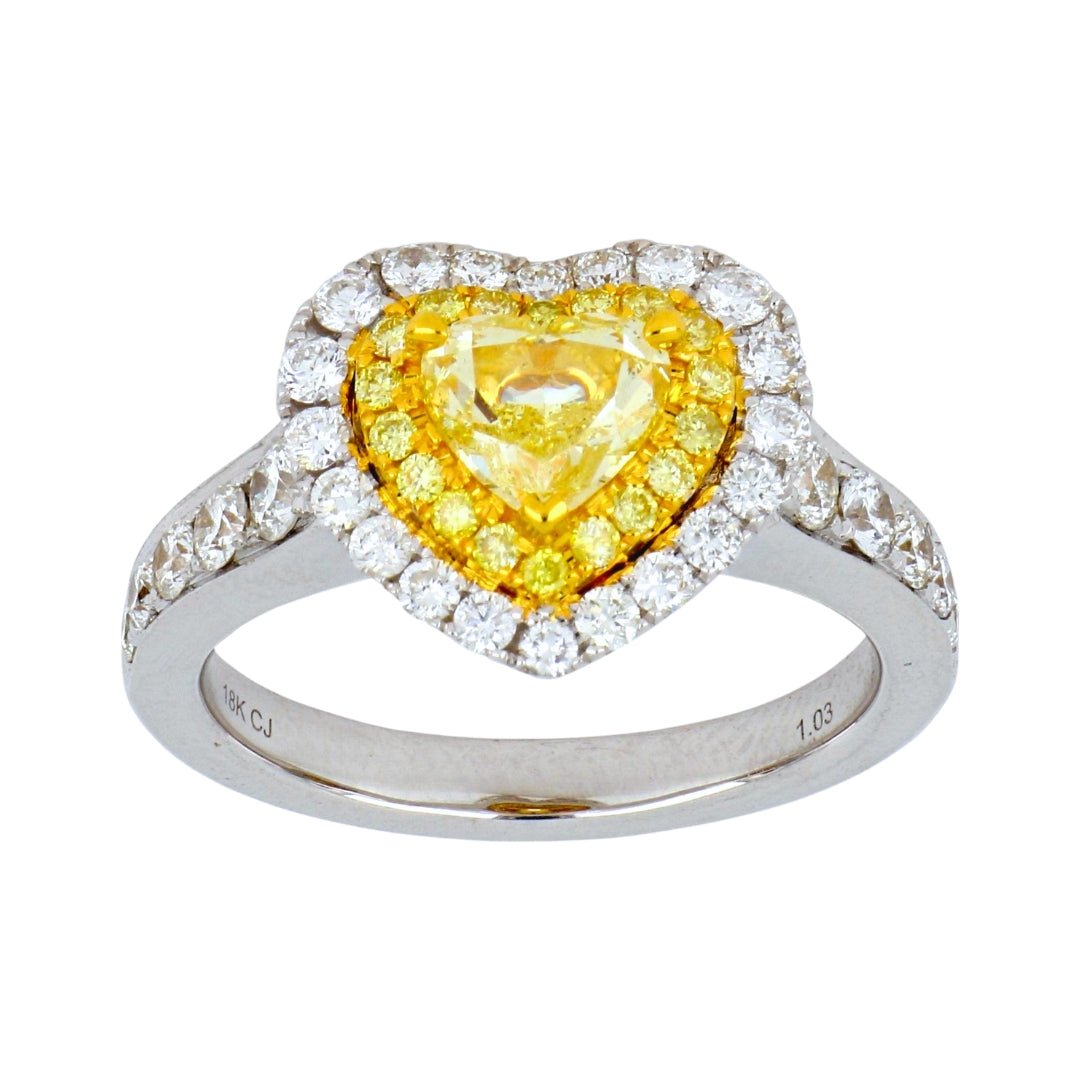 Yellow Diamond Ring (Yellow Diamond 1.03 cts. Yellow Diamond 0.17 cts. White Diamond 0.86 cts.) Not Net