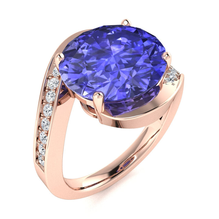 14KT Gold Oval Brilliant Cut Tanzanite and Diamond Ladies Ring (Tanzanite 3.50 cts. White Diamonds 0.33 cts.)
