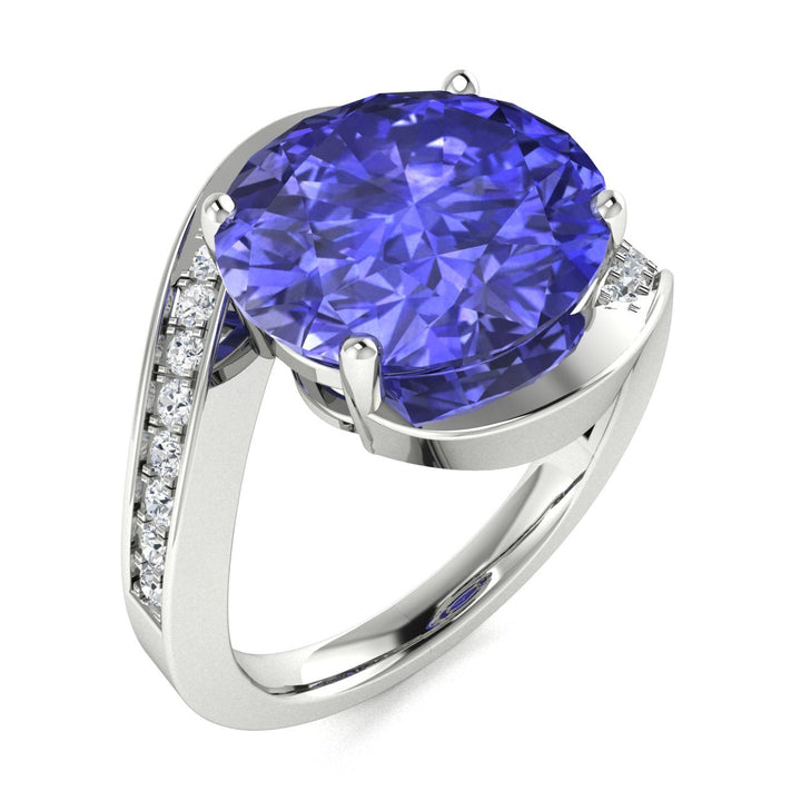 14KT Gold Oval Brilliant Cut Tanzanite and Diamond Ladies Ring (Tanzanite 3.50 cts. White Diamonds 0.33 cts.)