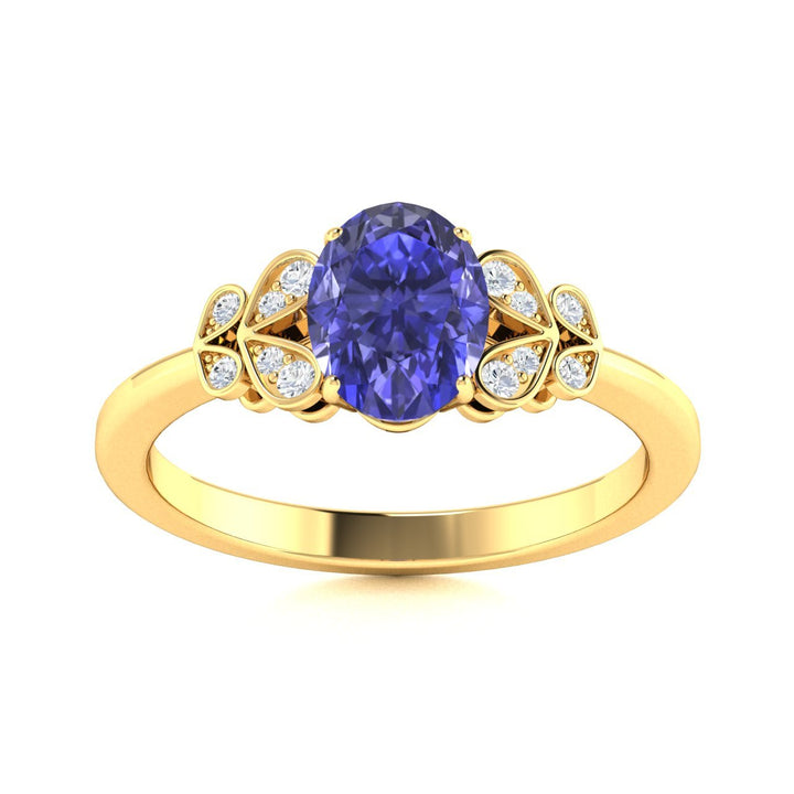14KT Gold Oval Cut Tanzanite and Diamond Ring (Tanzanite 0.95 cts White Diamonds 0.04 cts)