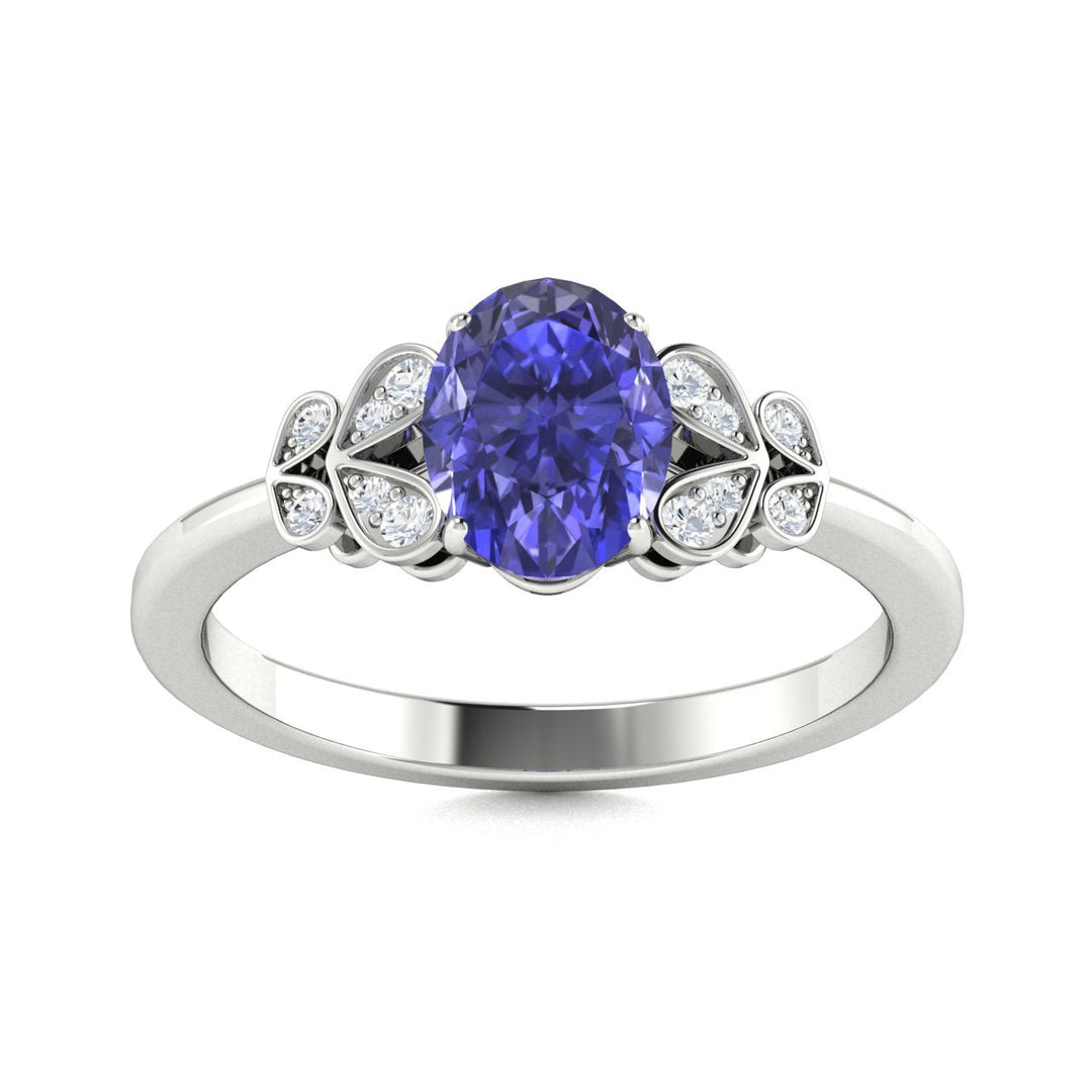 14KT Gold Oval Cut Tanzanite and Diamond Ring (Tanzanite 0.95 cts White Diamonds 0.04 cts)