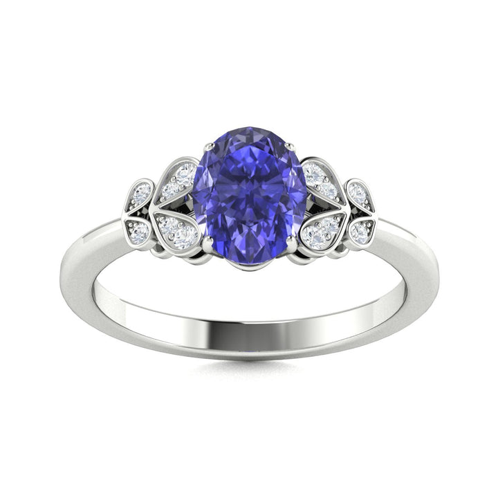 14KT Gold Oval Cut Tanzanite and Diamond Ring (Tanzanite 0.95 cts White Diamonds 0.04 cts)