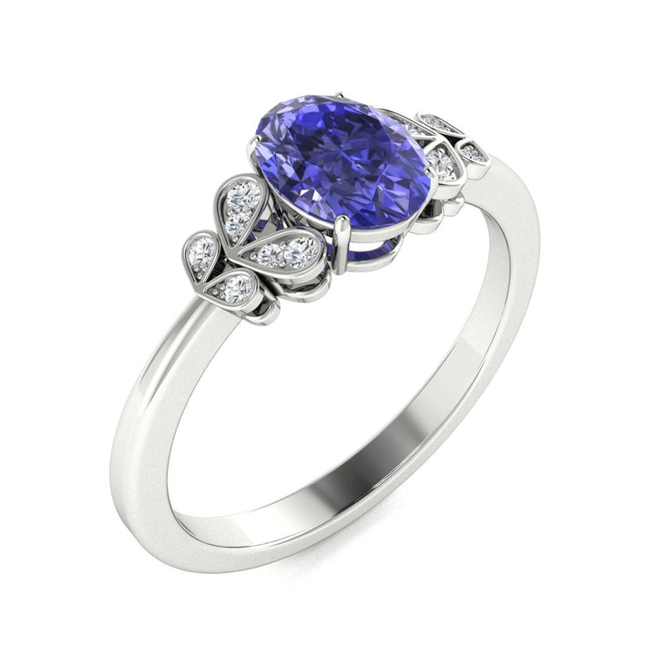 14KT Gold Oval Cut Tanzanite and Diamond Ring (Tanzanite 0.95 cts White Diamonds 0.04 cts)