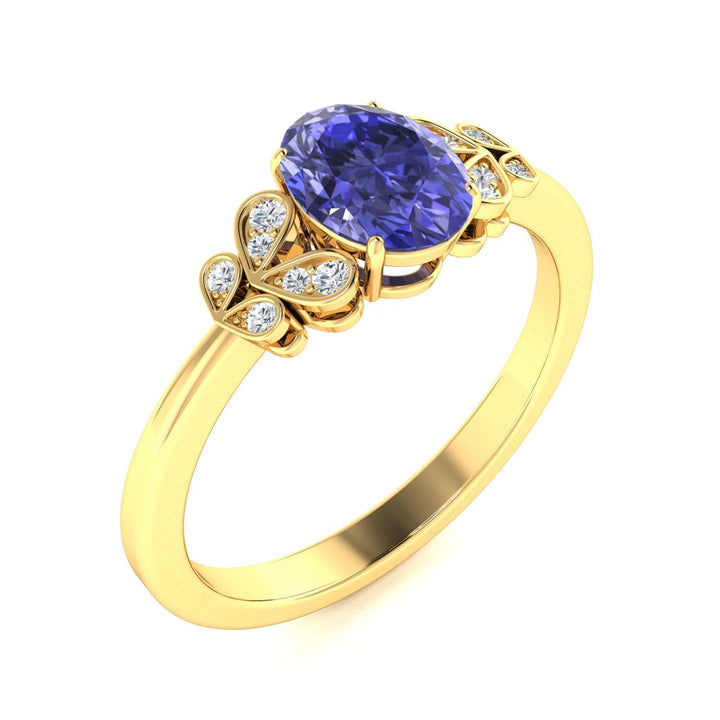 14KT Gold Oval Cut Tanzanite and Diamond Ring (Tanzanite 0.95 cts White Diamonds 0.04 cts)