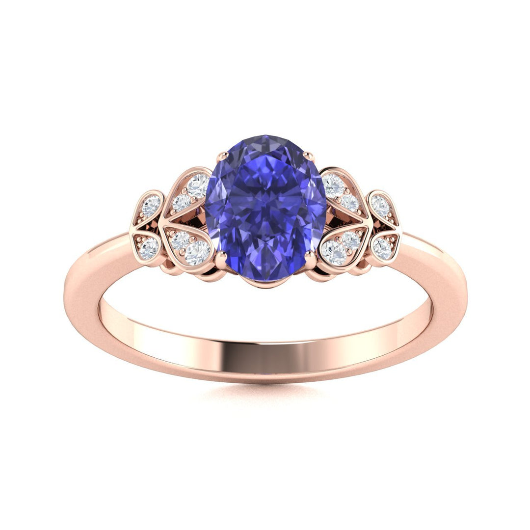 14KT Gold Oval Cut Tanzanite and Diamond Ring (Tanzanite 0.95 cts White Diamonds 0.04 cts)