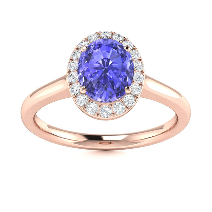 14kt Gold Oval Tanzanite and Diamond Ladies Ring (Tanzanite 0.70ct Diamonds 0.20 cts)