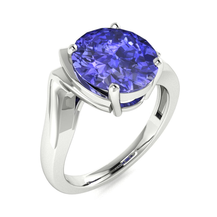 14KT Gold Oval Tanzanite and Diamond Ladies Ring (Tanzanite 3.25 cts. White Diamond 0.05 cts.)