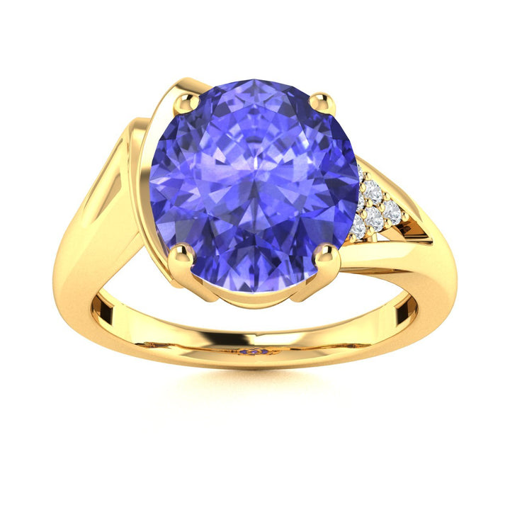 14KT Gold Oval Tanzanite and Diamond Ladies Ring (Tanzanite 3.25 cts. White Diamond 0.05 cts.)