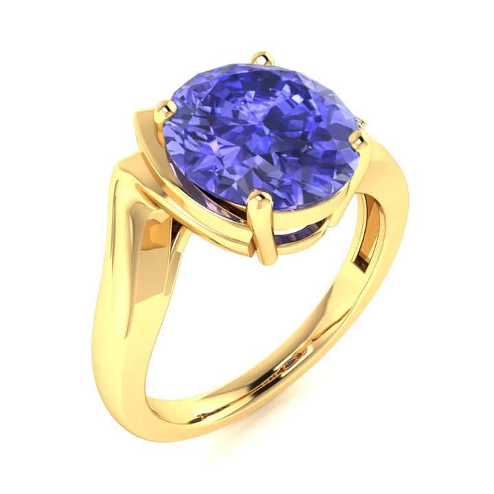 14KT Gold Oval Tanzanite and Diamond Ladies Ring (Tanzanite 3.25 cts. White Diamond 0.05 cts.)
