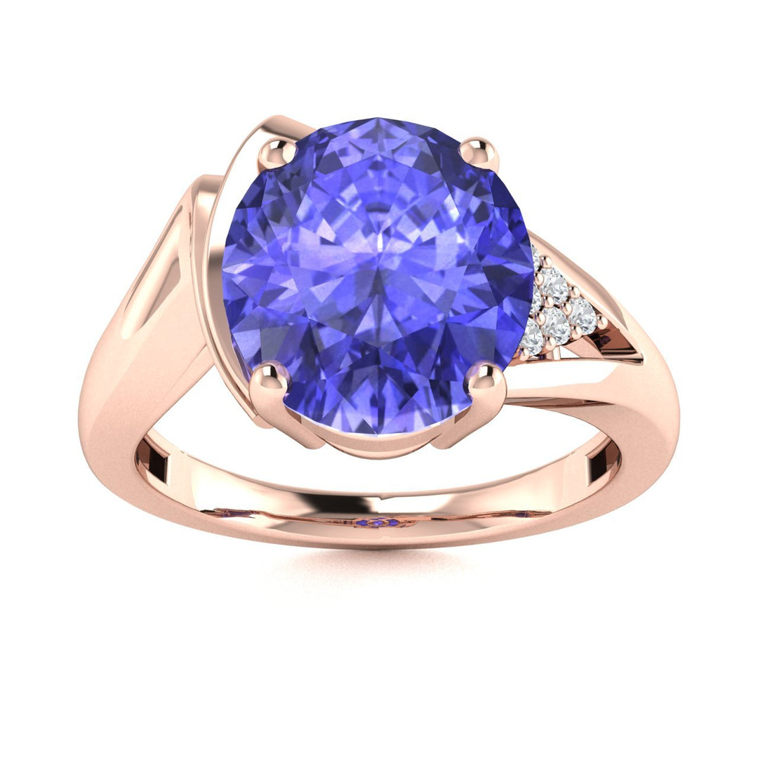 14KT Gold Oval Tanzanite and Diamond Ladies Ring (Tanzanite 3.25 cts. White Diamond 0.05 cts.)