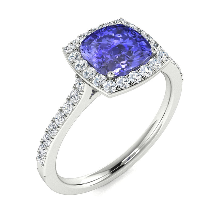 14KT Gold Round Brilliant Cut Tanzanite and Diamond Ladies Ring (Tanzanite 1.40 cts. White Diamonds 0.40 cts.)