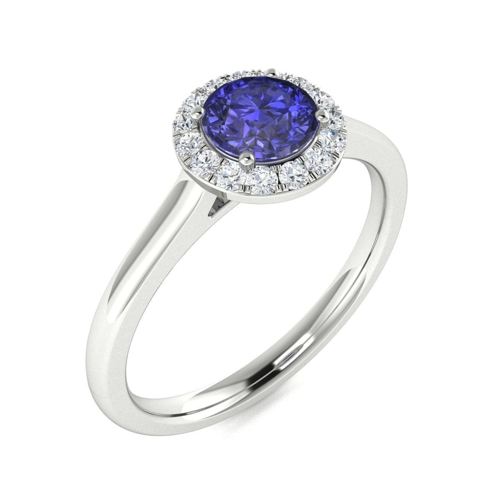 14KT Gold Round Brilliant Cut Tanzanite and Diamond Ladies Ring (Tanzanite .50 cts. White Diamonds 0.10 cts.)