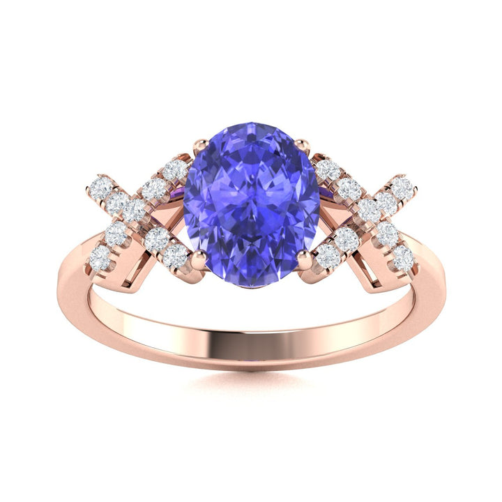 14KT Gold Tanzanite and Diamond Ladies Ring (Tanzanite 0.9 cts. White Diamond 0.04 cts.)