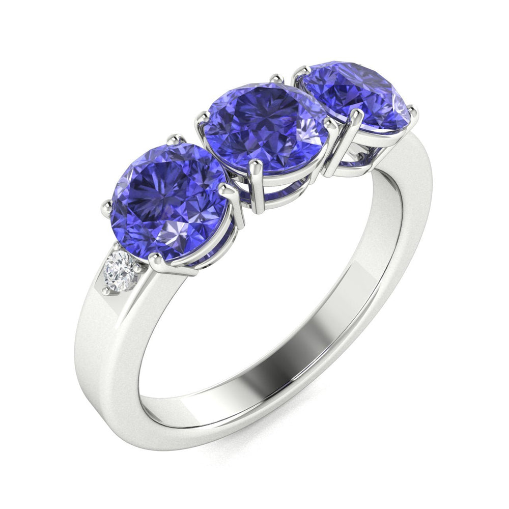 18KT Gold 3-stone Tanzanite and Diamond Ladies Ring (Tanzanite 1.25 cts. White Diamonds 0.10 cts.)