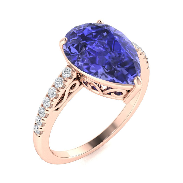 18kt Gold Pear Shaped Tanzanite and Diamond Ladies Ring (Tanzanite 3.25ct Diamonds 0.25 cts)