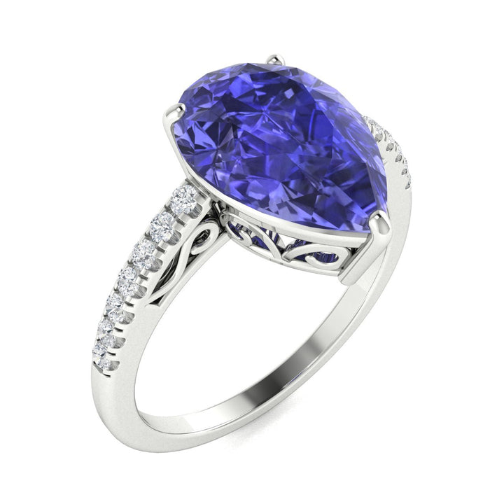 18kt Gold Pear Shaped Tanzanite and Diamond Ladies Ring (Tanzanite 3.25ct Diamonds 0.25 cts)