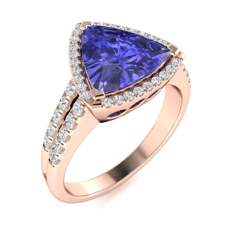 18KT Gold Tanzanite and Diamond Ladies Ring (Tanzanite 12.05 cts. White Diamond 0.71 cts.)