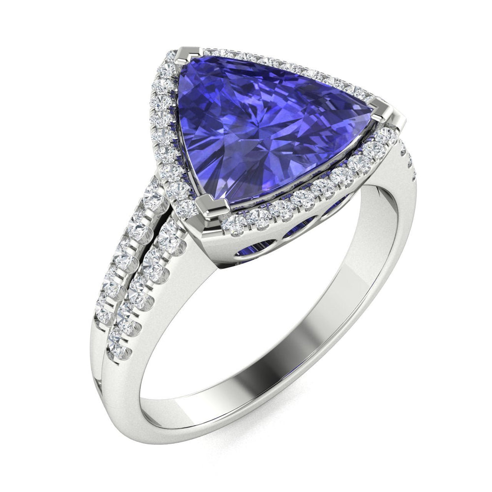 18KT Gold Tanzanite and Diamond Ladies Ring (Tanzanite 12.05 cts. White Diamond 0.71 cts.)