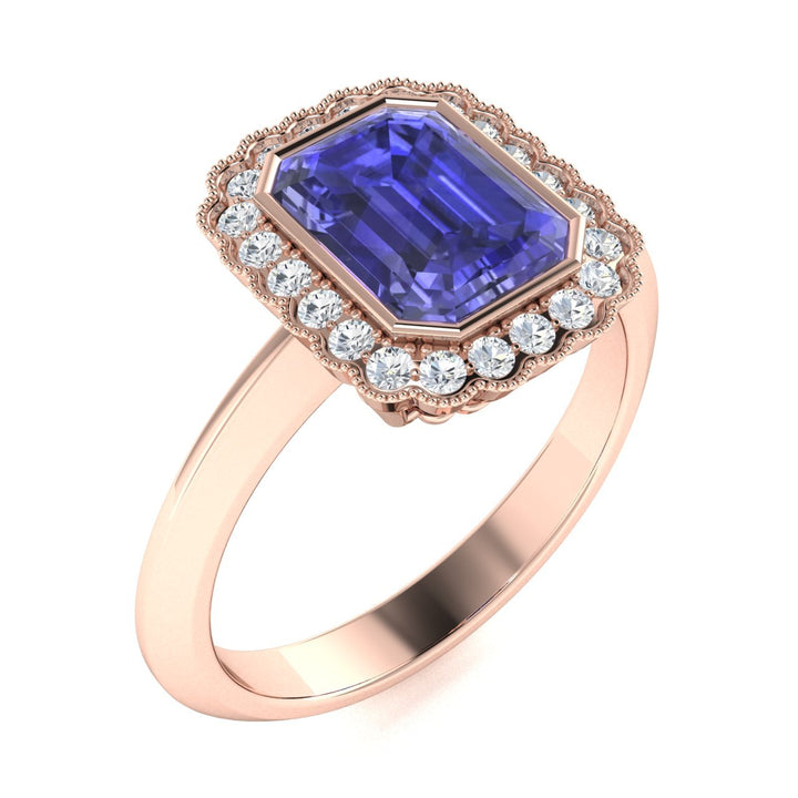 18KT Gold Tanzanite and Diamond Ladies Ring (Tanzanite 4.59 cts White Diamonds 0.56 cts)